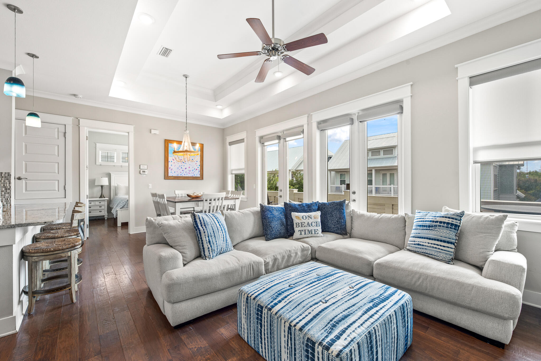26 Milestone Dr Inlet Beach, Unit C Inlet Beach, FL 32461 - Photo 3 of 36 a living room with furniture a ceiling fan and a window