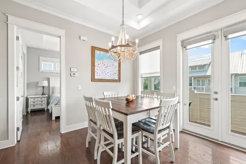 a dining room with furniture window wooden floor