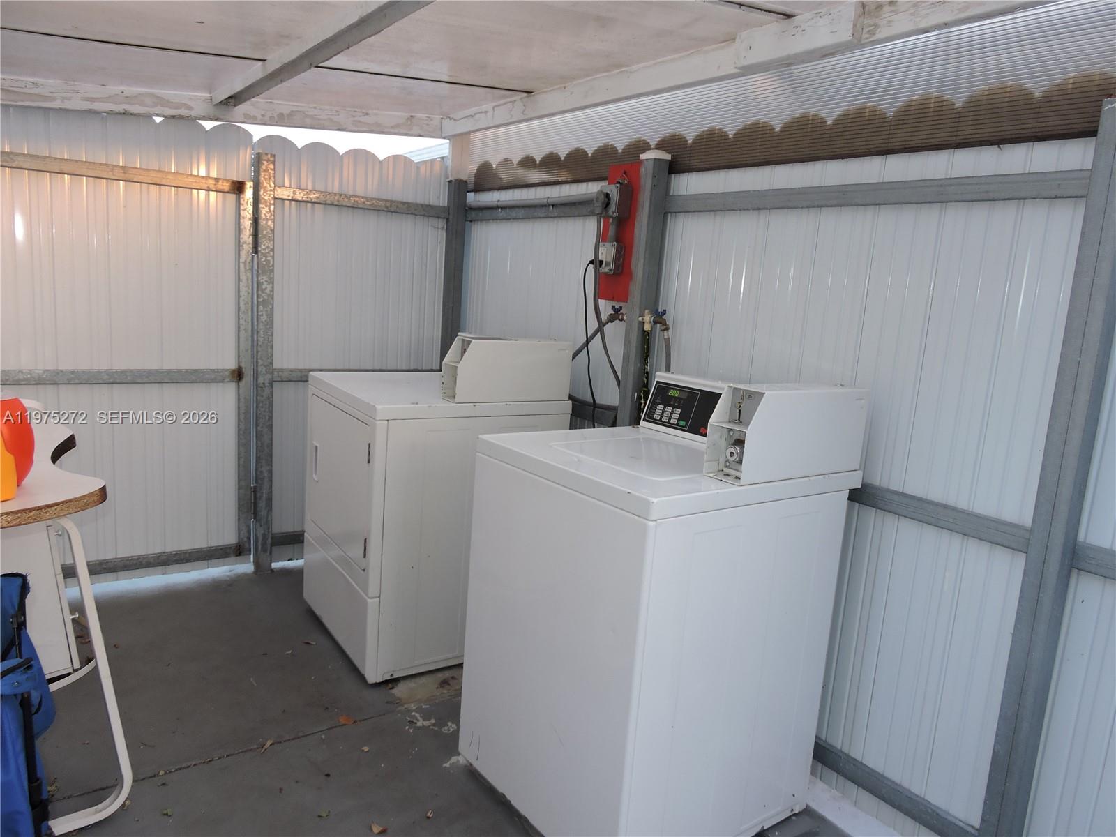 551 East 39th Street Hialeah, FL 33013 - Photo 14 of 14 a utility room with dryer and washer