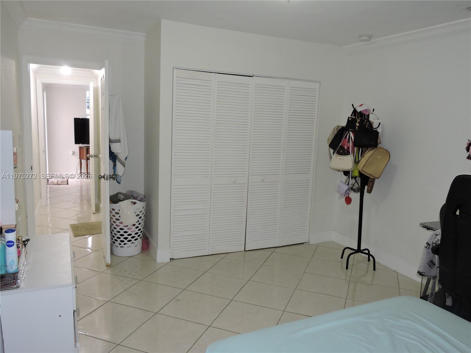 551 East 39th Street Hialeah, FL 33013 - Photo 5 of 14 a vase of flowers sitting on a table