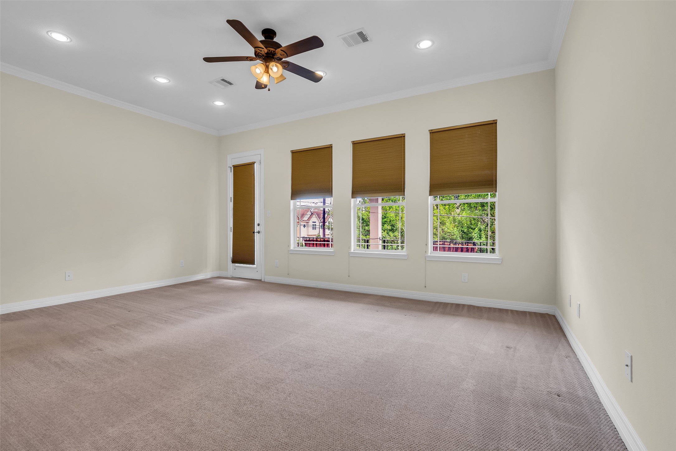 1423 Colorado Street Houston, TX 77007 - Photo 13 of 28 The second floor features the primary bedroom, facing the front of the home with windows that bring in plenty of natural light, creating a bright and comfortable retreat.