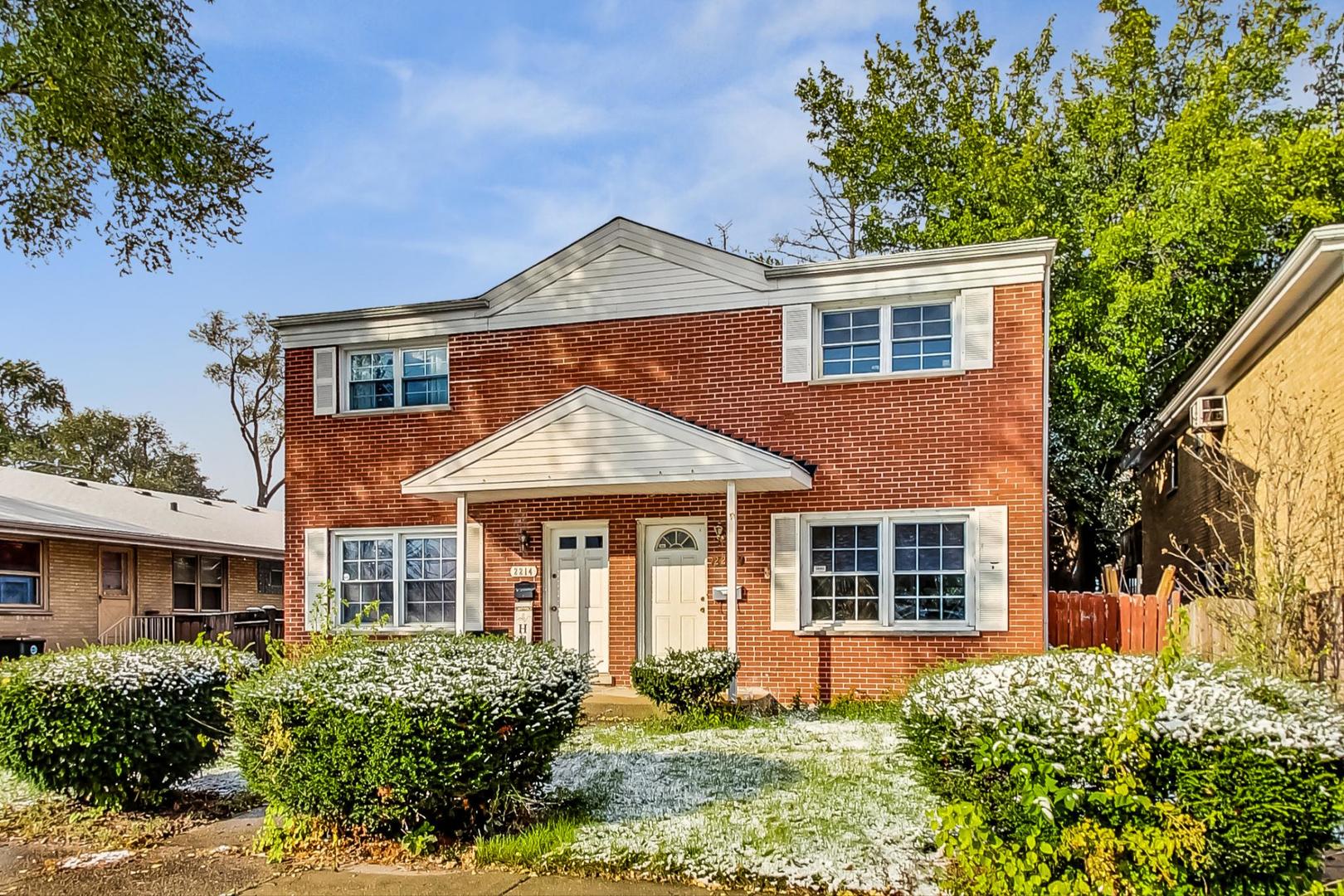 2212-2214 Oakton Street Park Ridge, IL 60068 - Photo 2 of 43 front view of a house with a yard