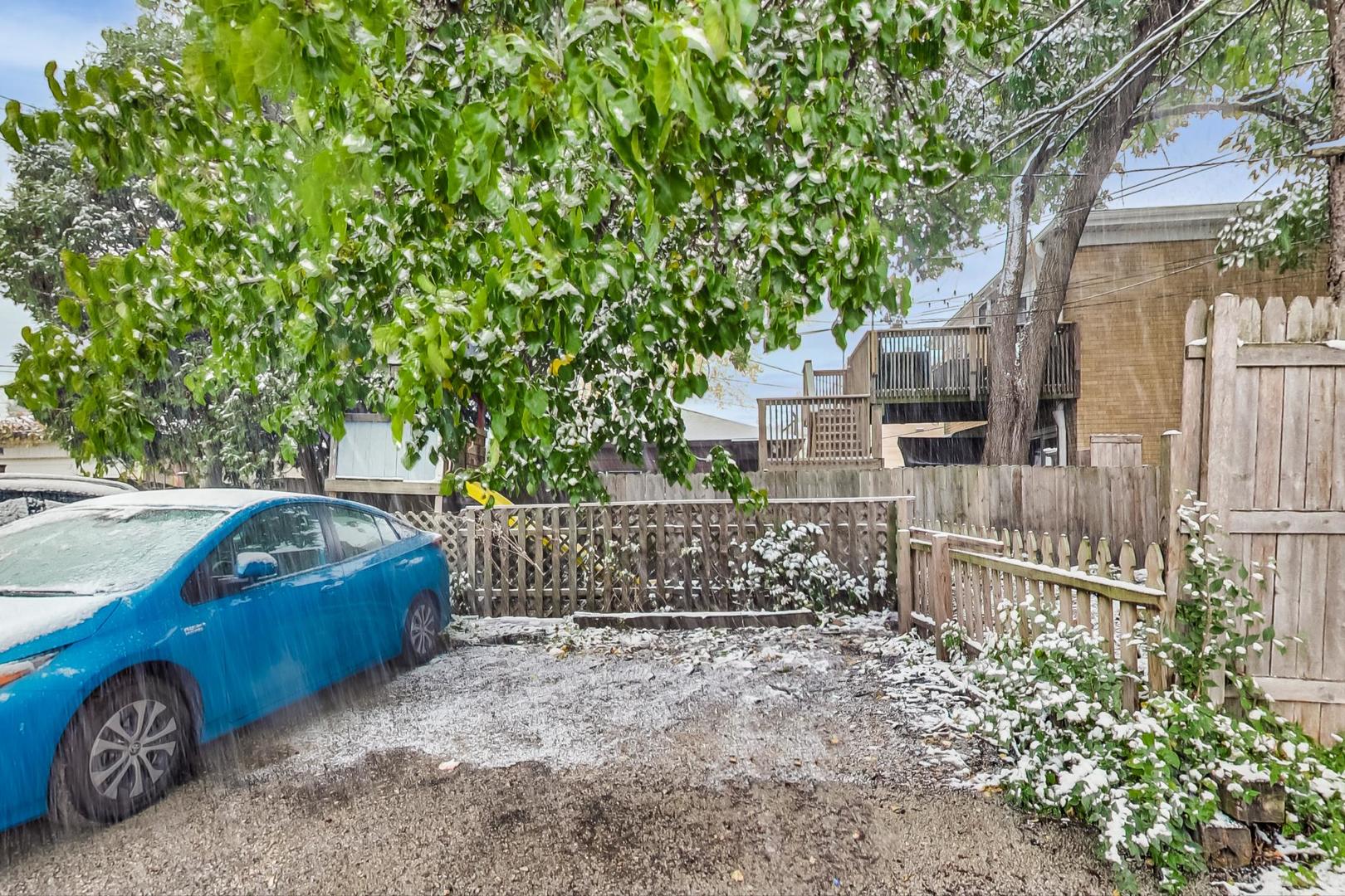2212-2214 Oakton Street Park Ridge, IL 60068 - Photo 39 of 43 a view of a house with a yard