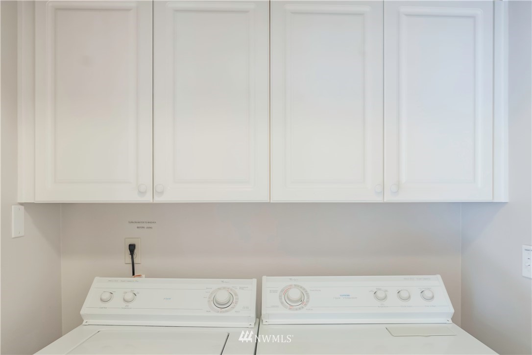 4319 Northeast 5th Court, Unit 102 Renton, WA 98059 - Photo 27 of 32 a bathroom with a sink