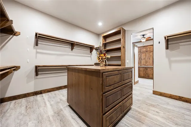 a view of a livingroom with gym equipment