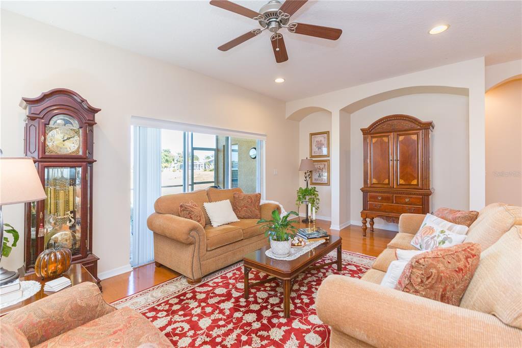 2816 Graphite Court Valrico, FL 33594 - Photo 17 of 57 a living room with furniture a rug and a window