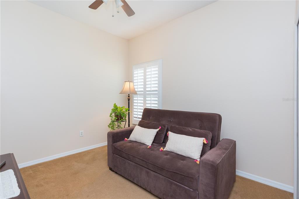 2816 Graphite Court Valrico, FL 33594 - Photo 25 of 57 a living room with a couch