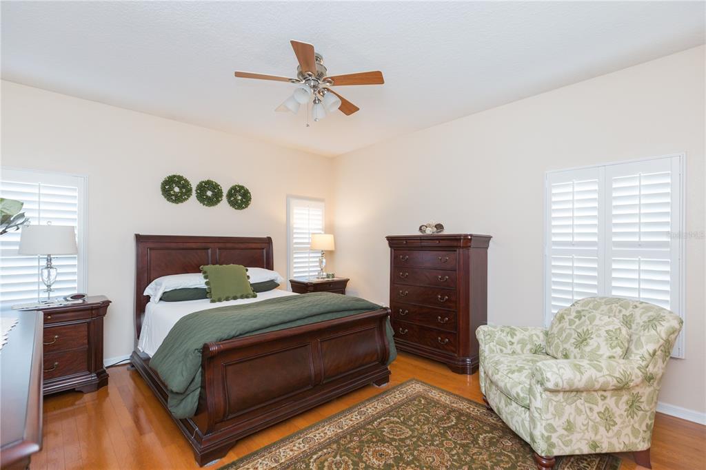 2816 Graphite Court Valrico, FL 33594 - Photo 27 of 57 a bedroom with a bed and furniture
