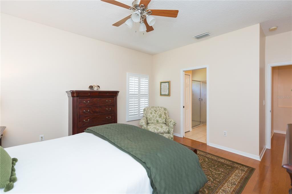 2816 Graphite Court Valrico, FL 33594 - Photo 28 of 57 a bedroom with a bed and a window