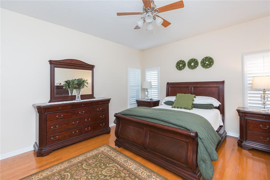 2816 Graphite Court Valrico, FL 33594 - Photo 30 of 57 a bedroom with a bed and a window