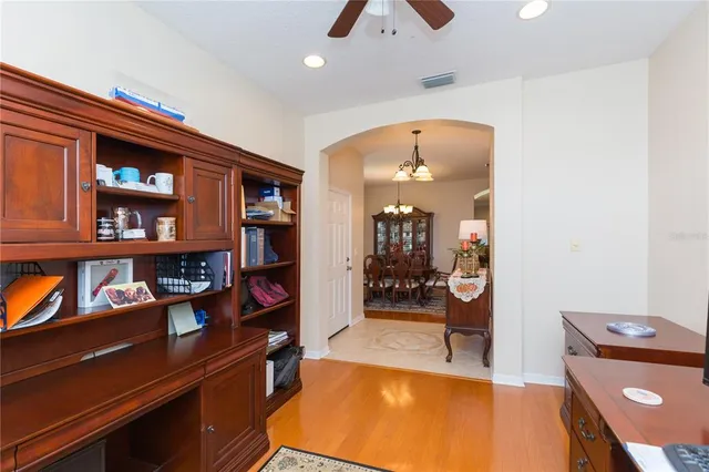 a living room with lots of furniture and bathroom view