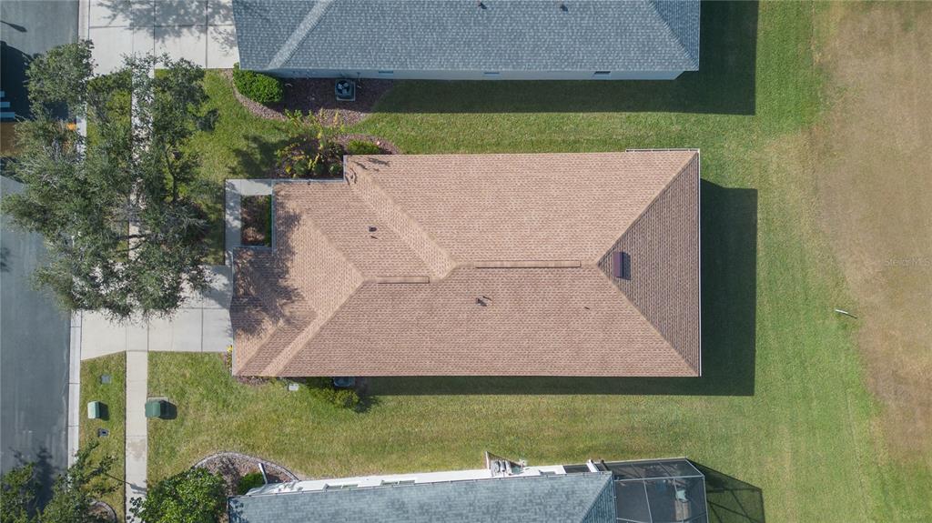 2816 Graphite Court Valrico, FL 33594 - Photo 41 of 57 an aerial view of a house with a yard