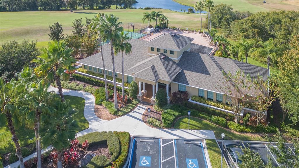 2816 Graphite Court Valrico, FL 33594 - Photo 49 of 57 an aerial view of a house with a garden and lake view