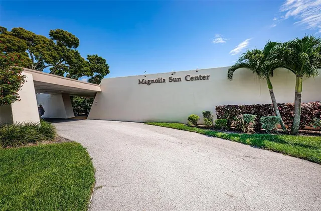 a view of a swimming pool with a bench