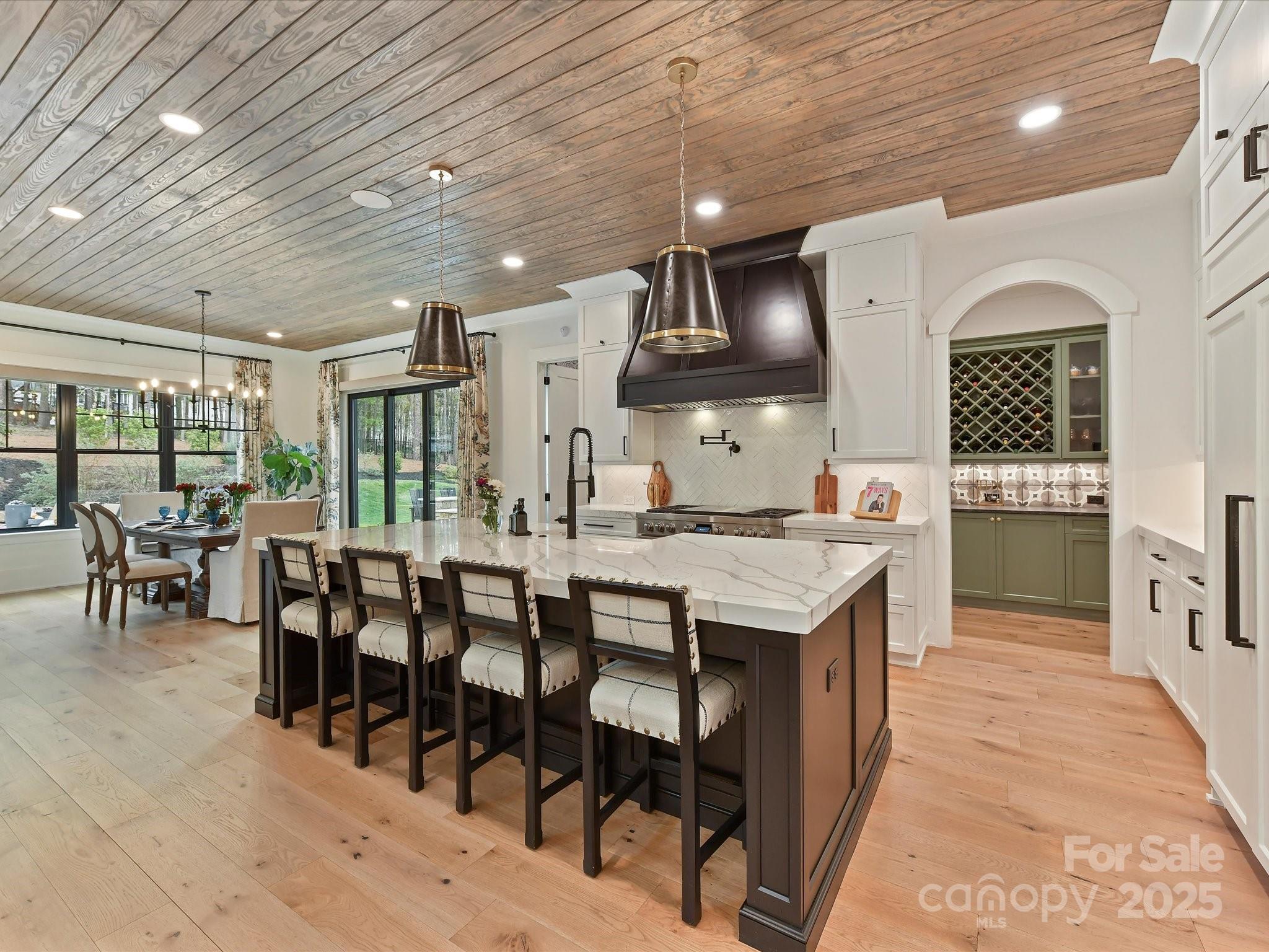 2954 Holbrook Road Fort Mill, SC 29715 - Photo 11 of 47 a large kitchen with lots of counter space and furniture