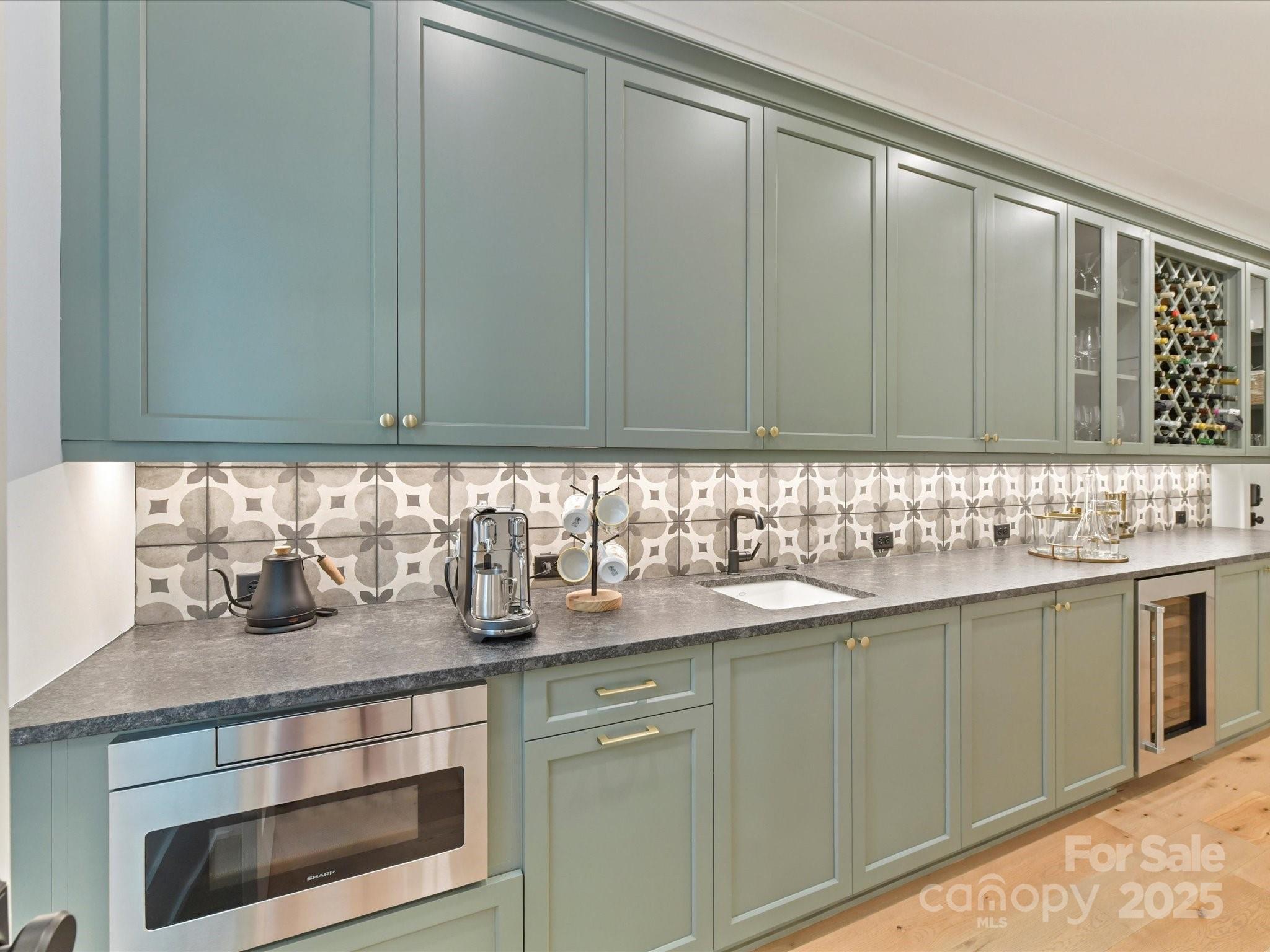 2954 Holbrook Road Fort Mill, SC 29715 - Photo 13 of 47 a kitchen with a sink and cabinets