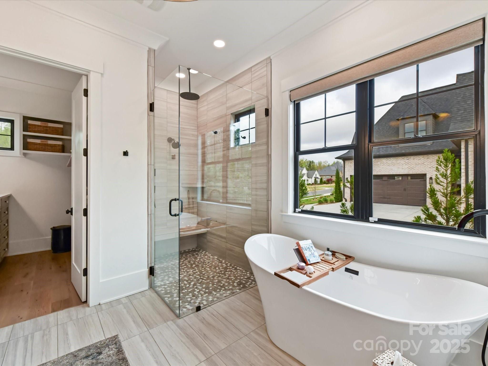 2954 Holbrook Road Fort Mill, SC 29715 - Photo 17 of 47 a bathroom with a tub shower and sink