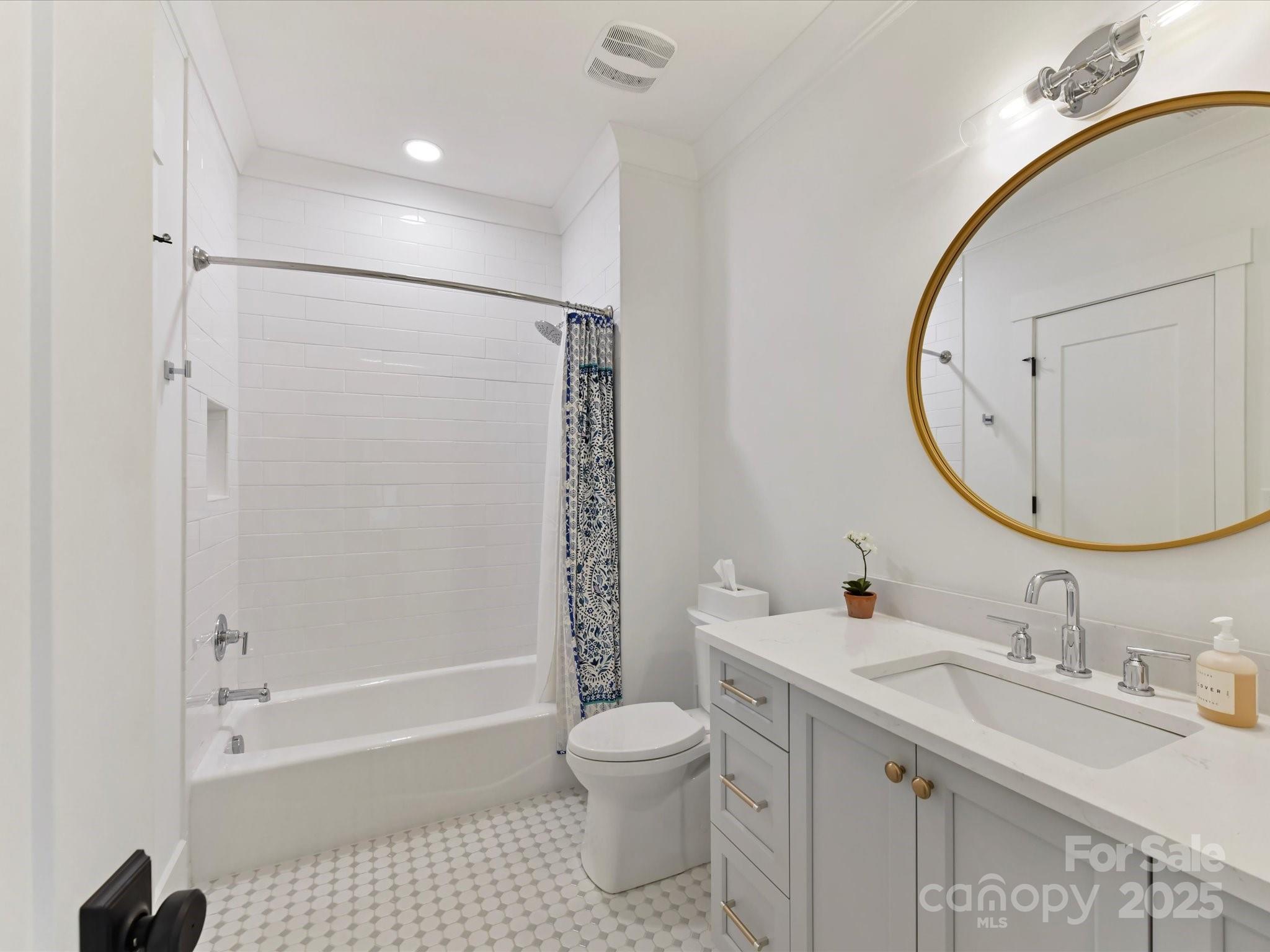 2954 Holbrook Road Fort Mill, SC 29715 - Photo 28 of 47 a bathroom with a sink a toilet and a mirror