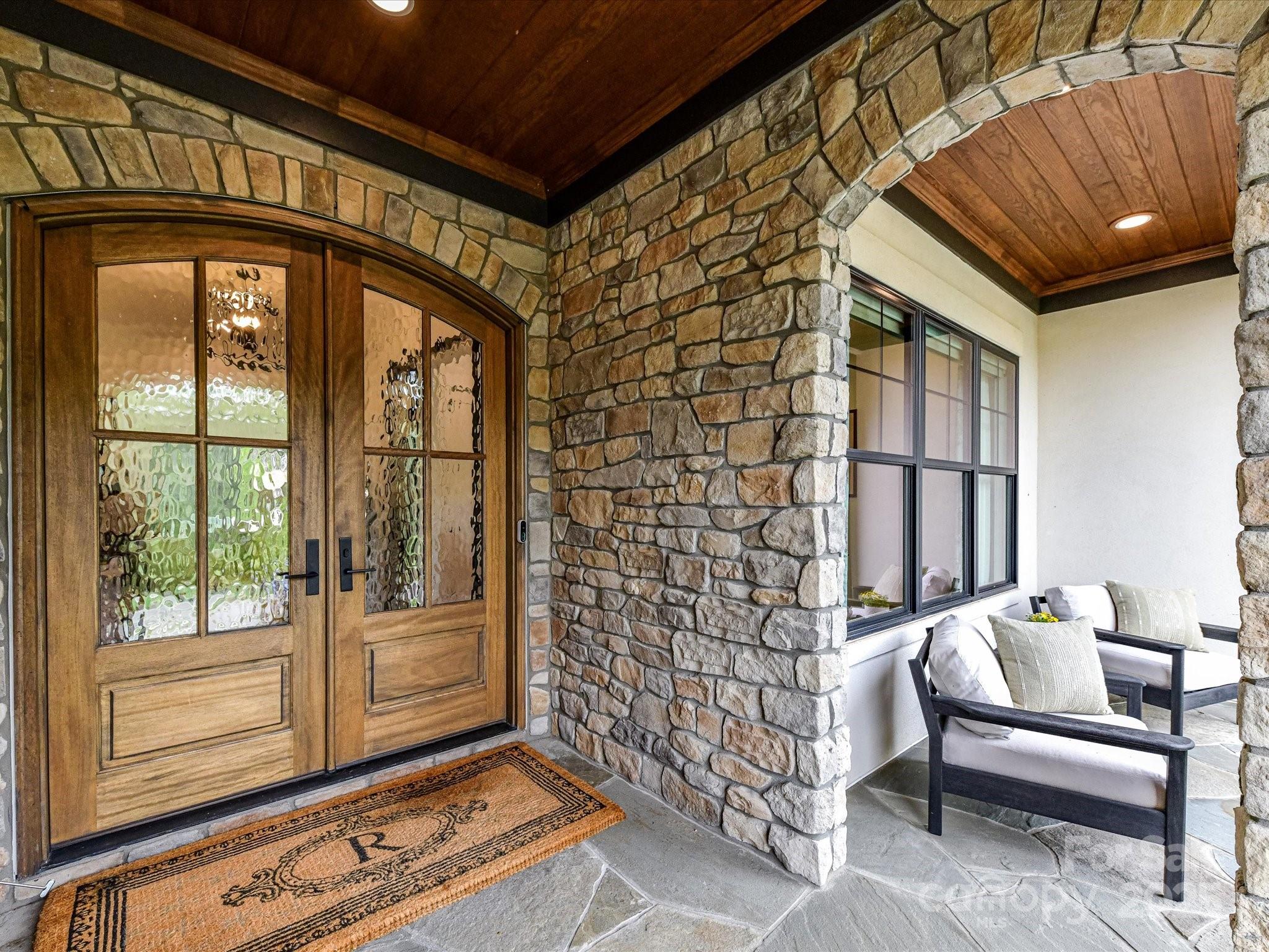 2954 Holbrook Road Fort Mill, SC 29715 - Photo 3 of 47 a view of a balcony with furniture and floor to ceiling window