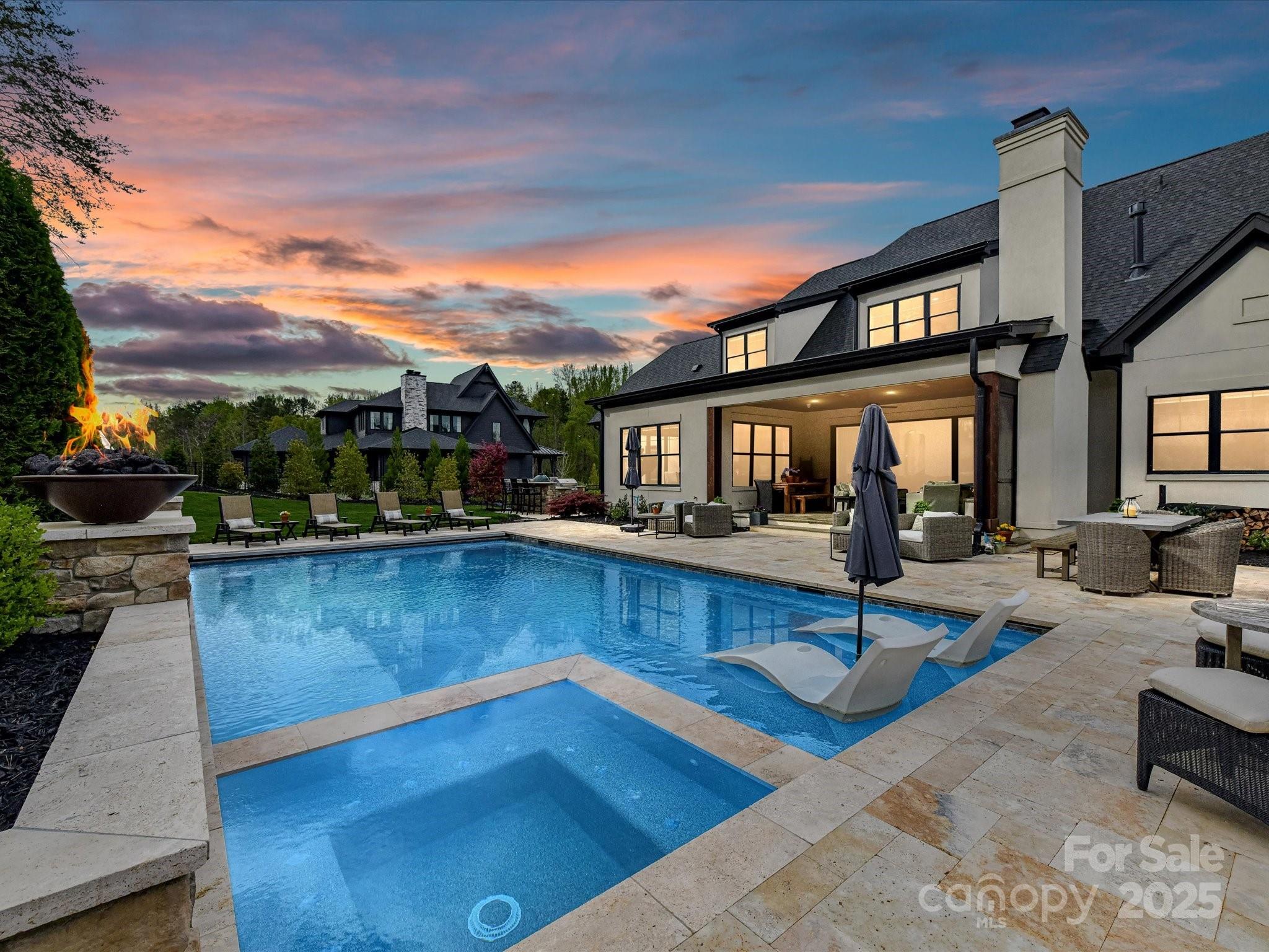 2954 Holbrook Road Fort Mill, SC 29715 - Photo 47 of 47 a view of a patio with swimming pool table and chairs