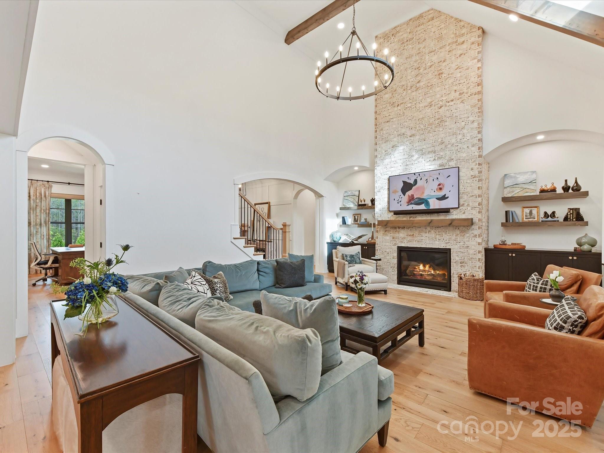 2954 Holbrook Road Fort Mill, SC 29715 - Photo 9 of 47 a living room with furniture and a fireplace