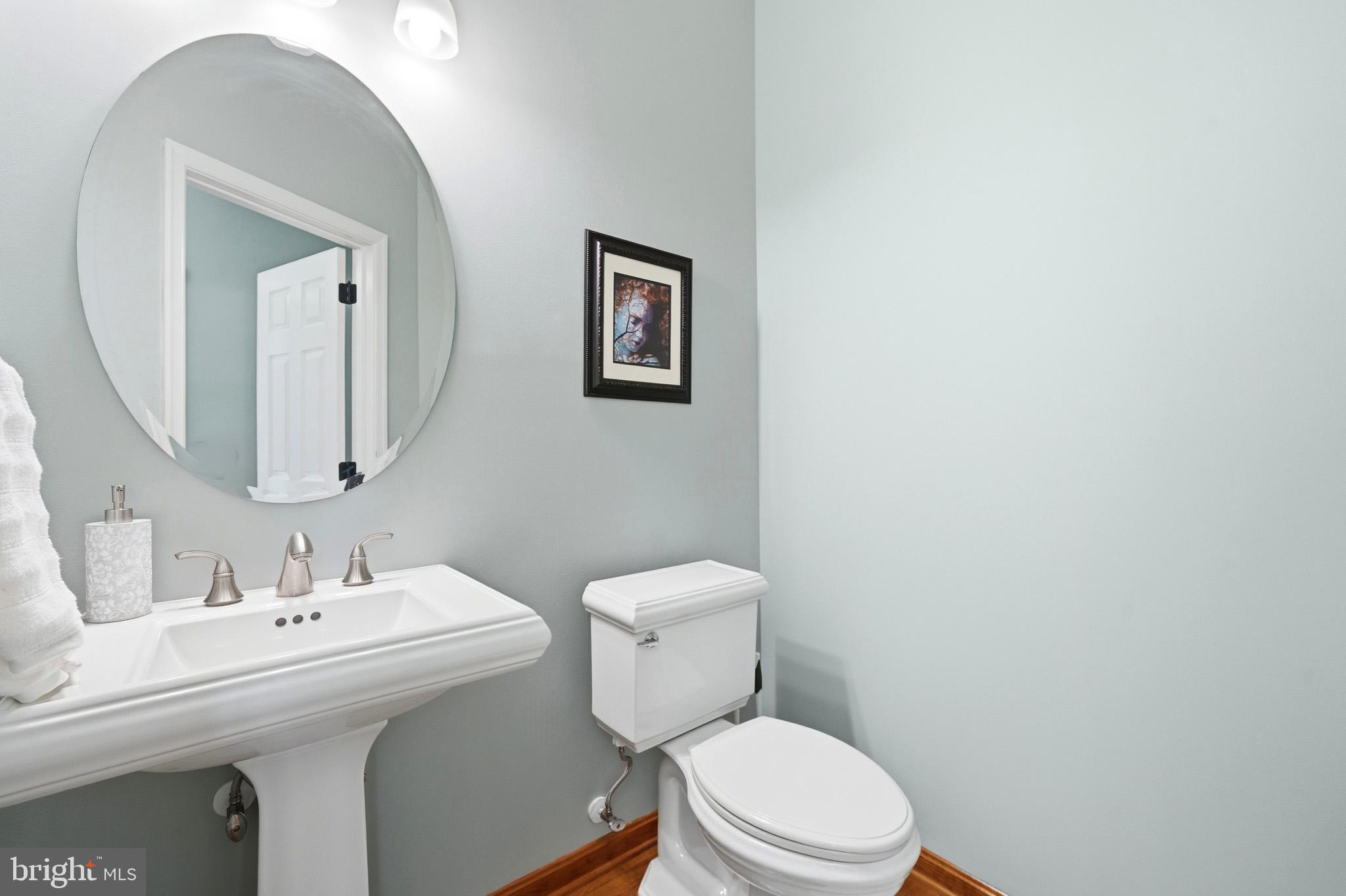 3148 Holland Cliffs Road Huntingtown, MD 20639 - Photo 7 of 61 Stylish main-level half bath.