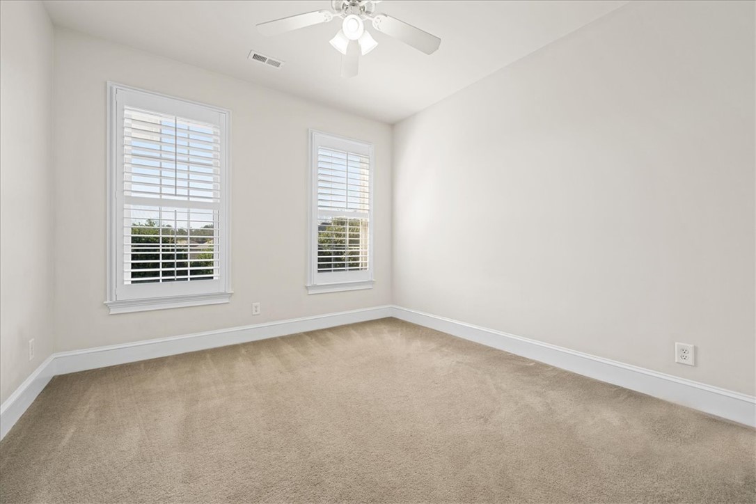 38 Angus Run Seneca, SC 29672 - Photo 21 of 46 Bright and airy, this room features ample natural light and plush carpeting.