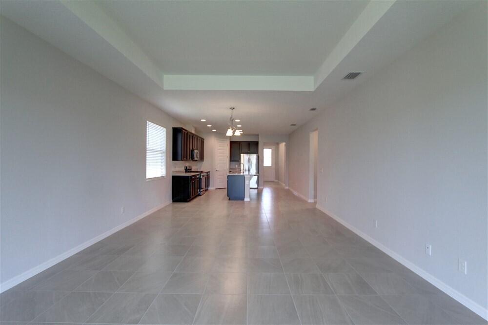 2508 Pangea Circle Melbourne, FL 32940 - Photo 11 of 34 a view of a livingroom with a kitchen