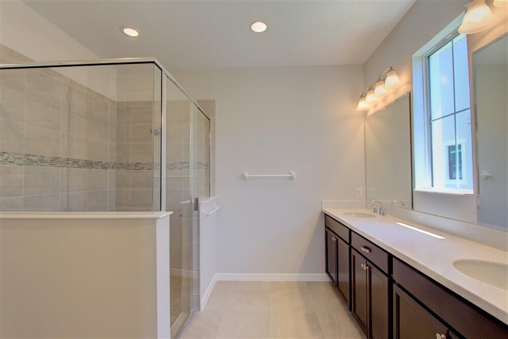 2508 Pangea Circle Melbourne, FL 32940 - Photo 15 of 34 a bathroom with a shower and a sink