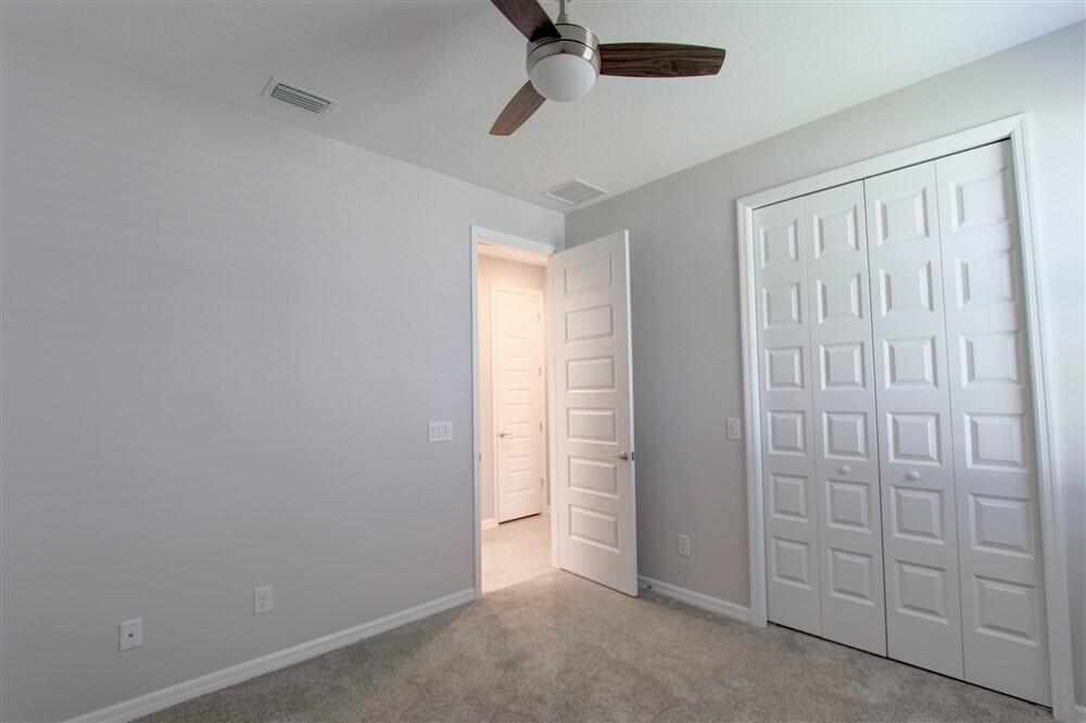 2508 Pangea Circle Melbourne, FL 32940 - Photo 21 of 34 an empty room with closet area