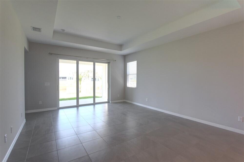 2508 Pangea Circle Melbourne, FL 32940 - Photo 28 of 34 a view of an empty room with a window