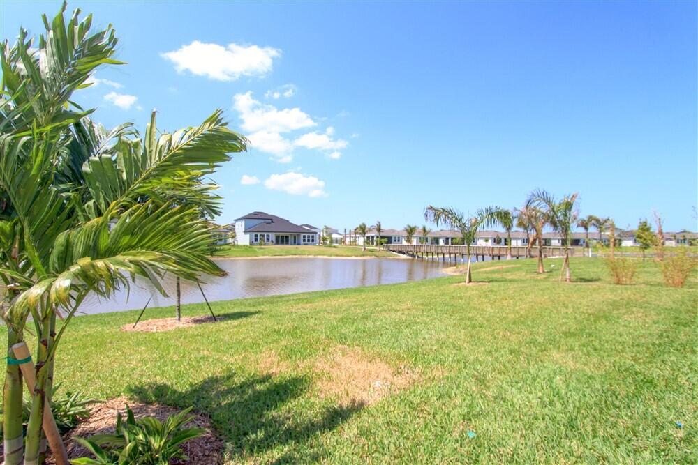 2508 Pangea Circle Melbourne, FL 32940 - Photo 33 of 34 a view of a lake with a big yard