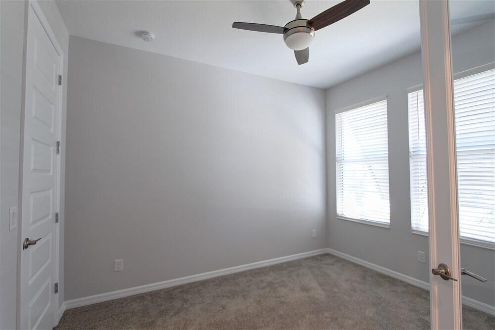 2508 Pangea Circle Melbourne, FL 32940 - Photo 5 of 34 a view of an empty room with a window