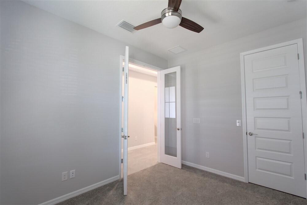 2508 Pangea Circle Melbourne, FL 32940 - Photo 6 of 34 a view of an empty room and closet area