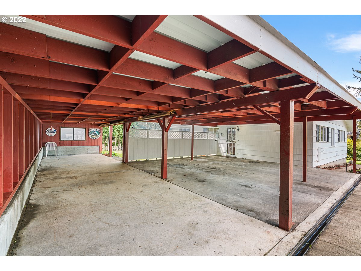 9020 Southwest Terwilliger Boulevard Portland, OR 97219 - Photo 22 of 31 a view of a backyard of a house