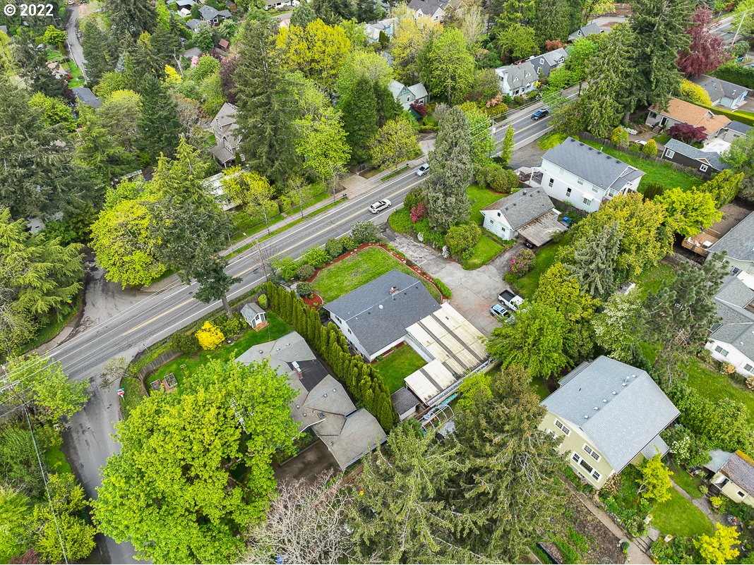 9020 Southwest Terwilliger Boulevard Portland, OR 97219 - Photo 28 of 31 an aerial view of a house with a yard