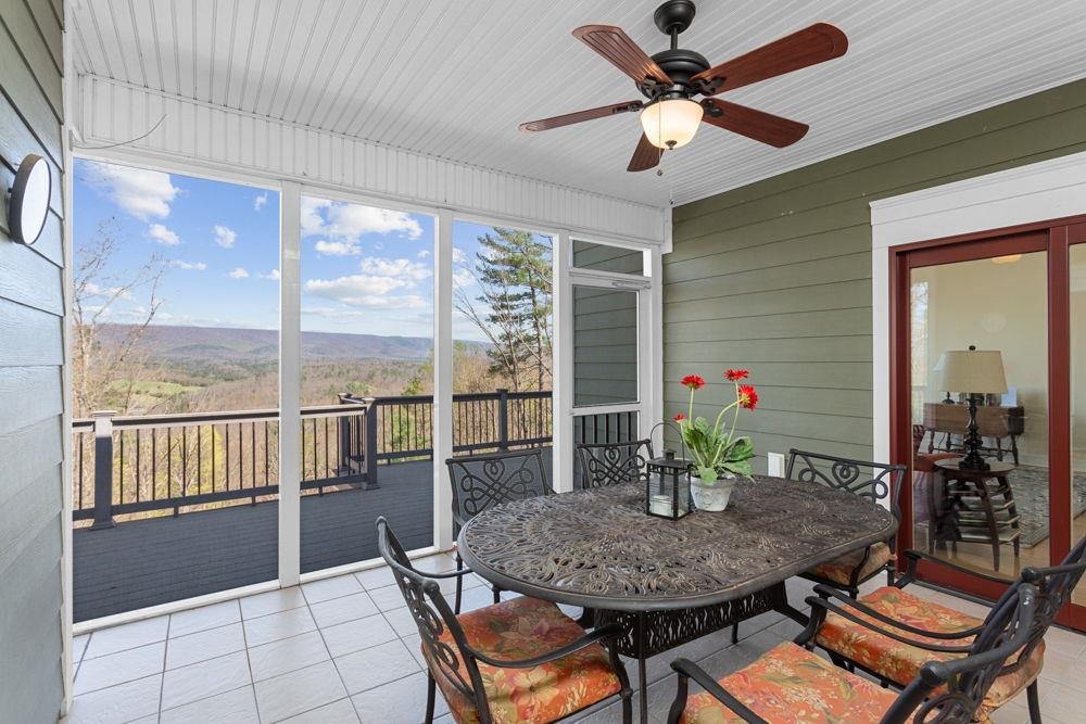9586 Brunk Spring Lane Broadway, VA 22815 - Photo 22 of 58 a view of a dining room with furniture window and outside view