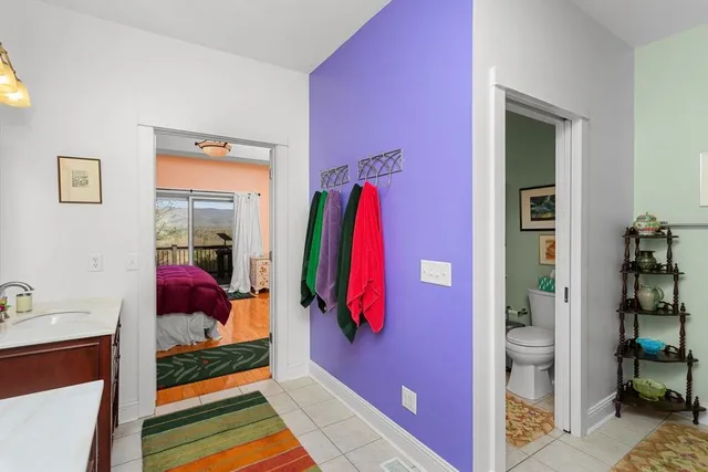 a bathroom with a toilet and a sink