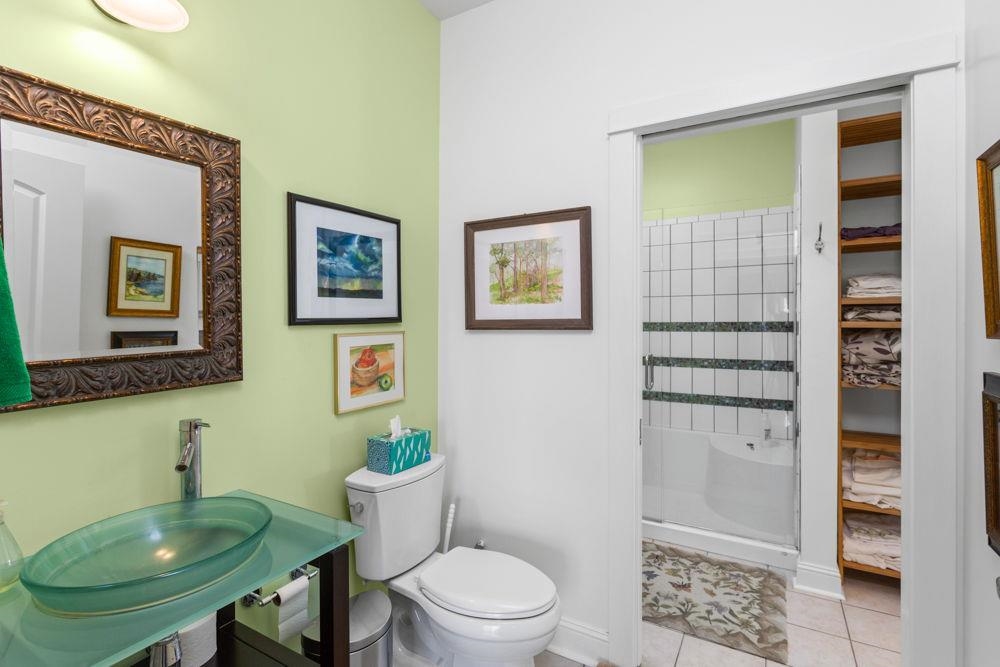 9586 Brunk Spring Lane Broadway, VA 22815 - Photo 29 of 58 a bathroom with a toilet and a sink
