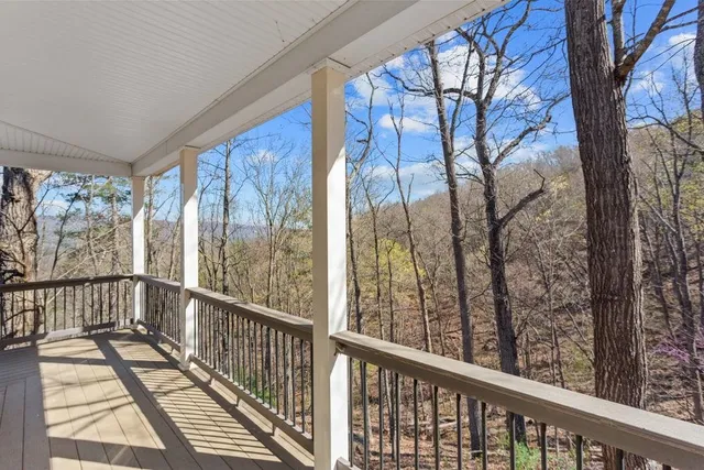 a front view of a house with a yard and porch