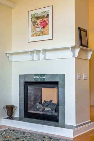 a living room with a fireplace