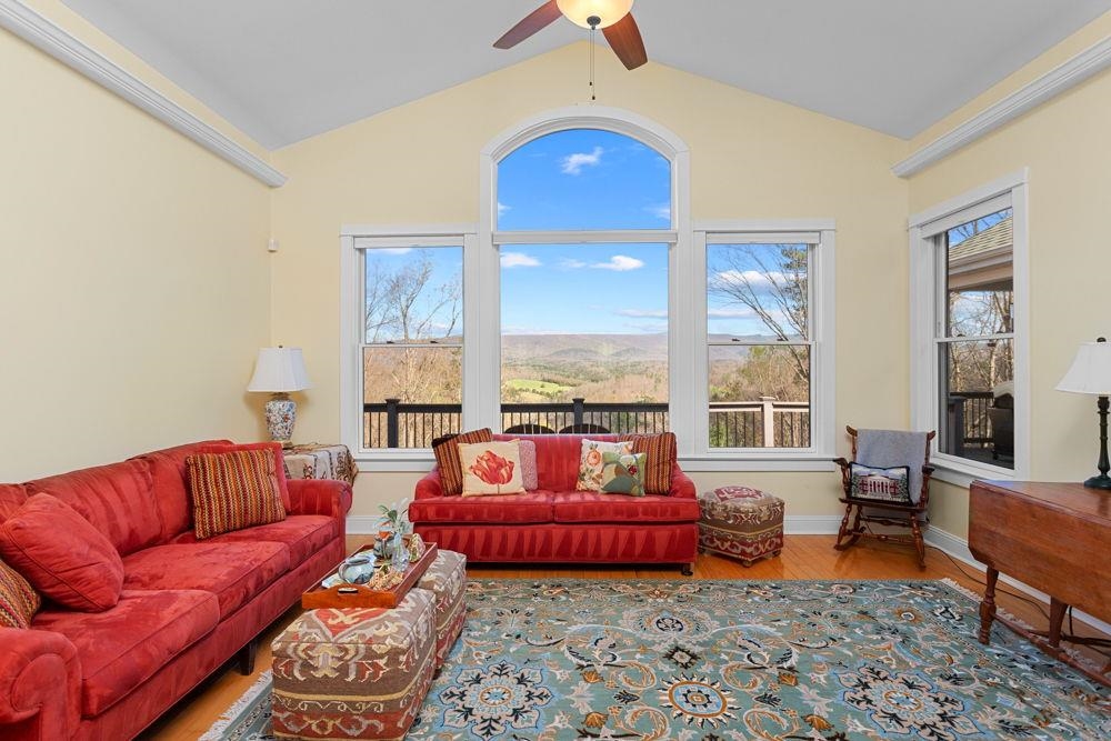 9586 Brunk Spring Lane Broadway, VA 22815 - Photo 9 of 58 a living room with furniture and a large window