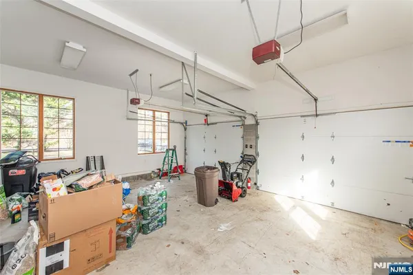 a room with gym equipment and windows