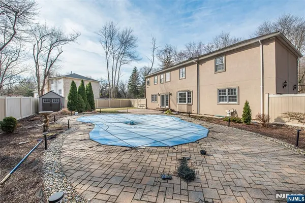 a view of a house with backyard