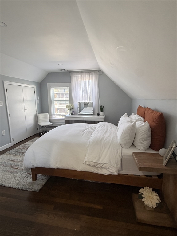 562 East 7th Street, Unit 2 Boston, MA 02127 - Photo 17 of 18 a large bed sitting in a bedroom and window