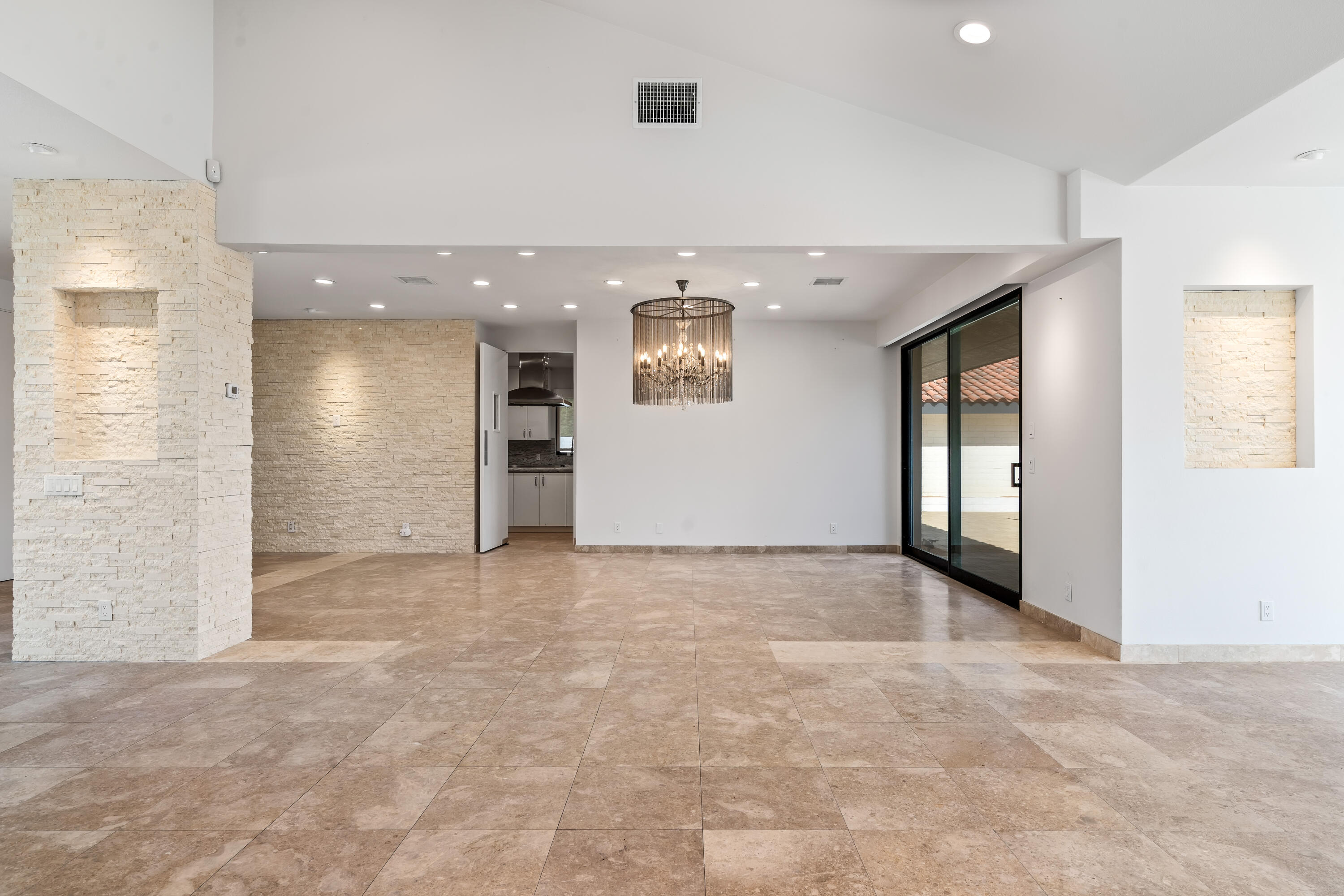 401 Iris Lane Rancho Mirage, CA 92270 - Photo 19 of 87 a view of an empty room with a window