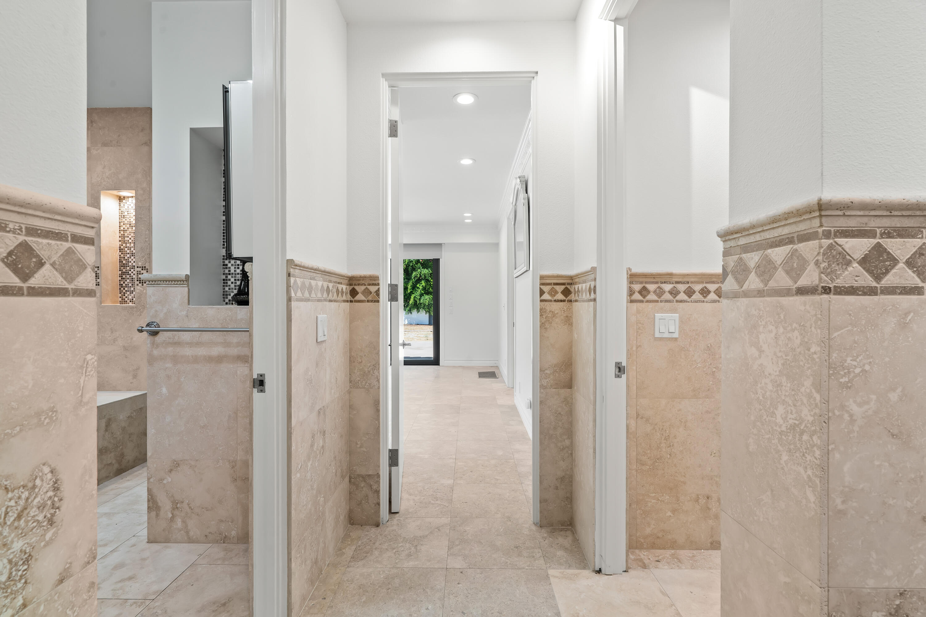 401 Iris Lane Rancho Mirage, CA 92270 - Photo 36 of 87 a bathroom with a shower and a glass door