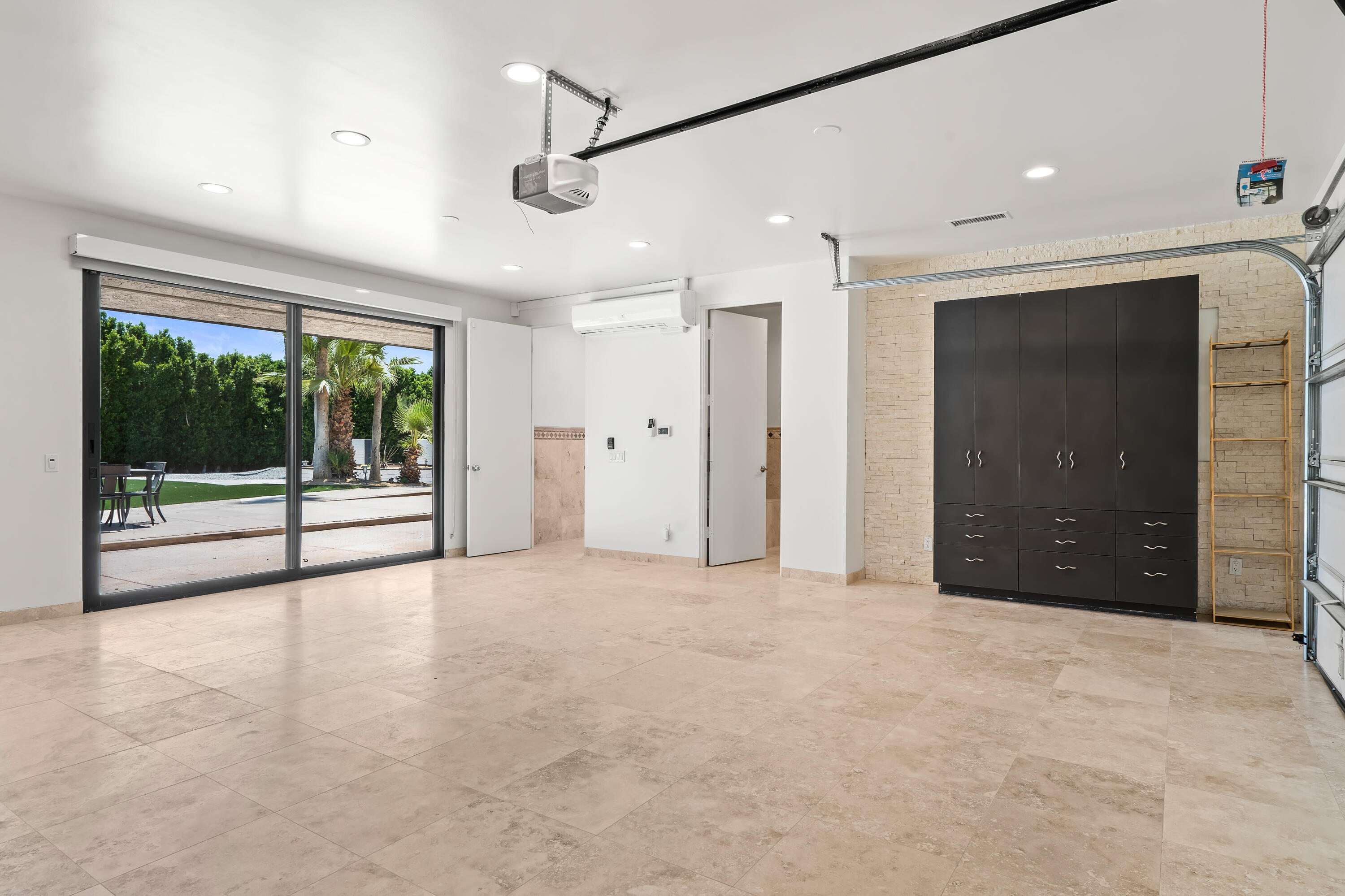401 Iris Lane Rancho Mirage, CA 92270 - Photo 51 of 87 a view of an empty room with a sliding door