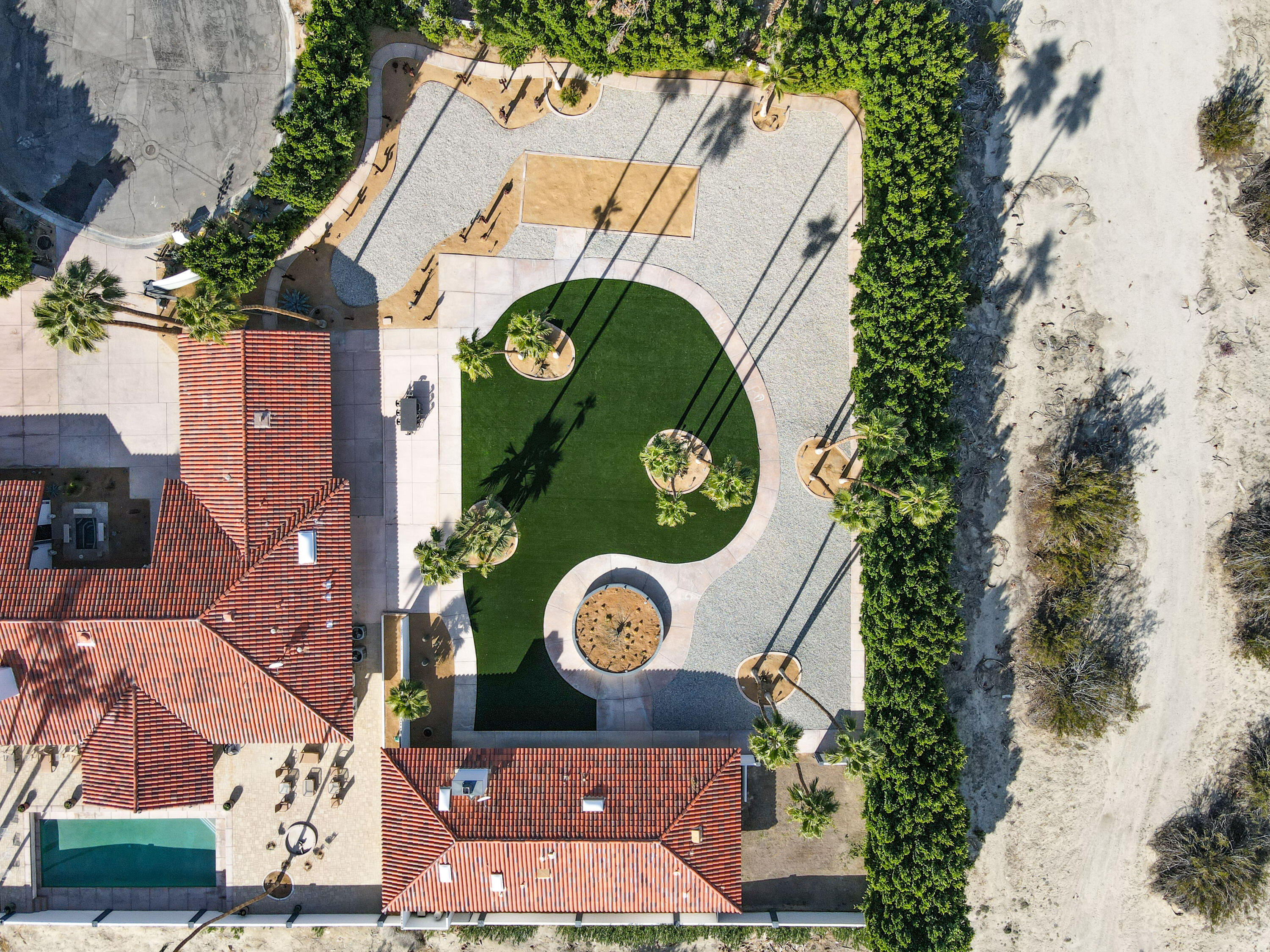 401 Iris Lane Rancho Mirage, CA 92270 - Photo 63 of 87 an aerial view of a house with a yard and green space