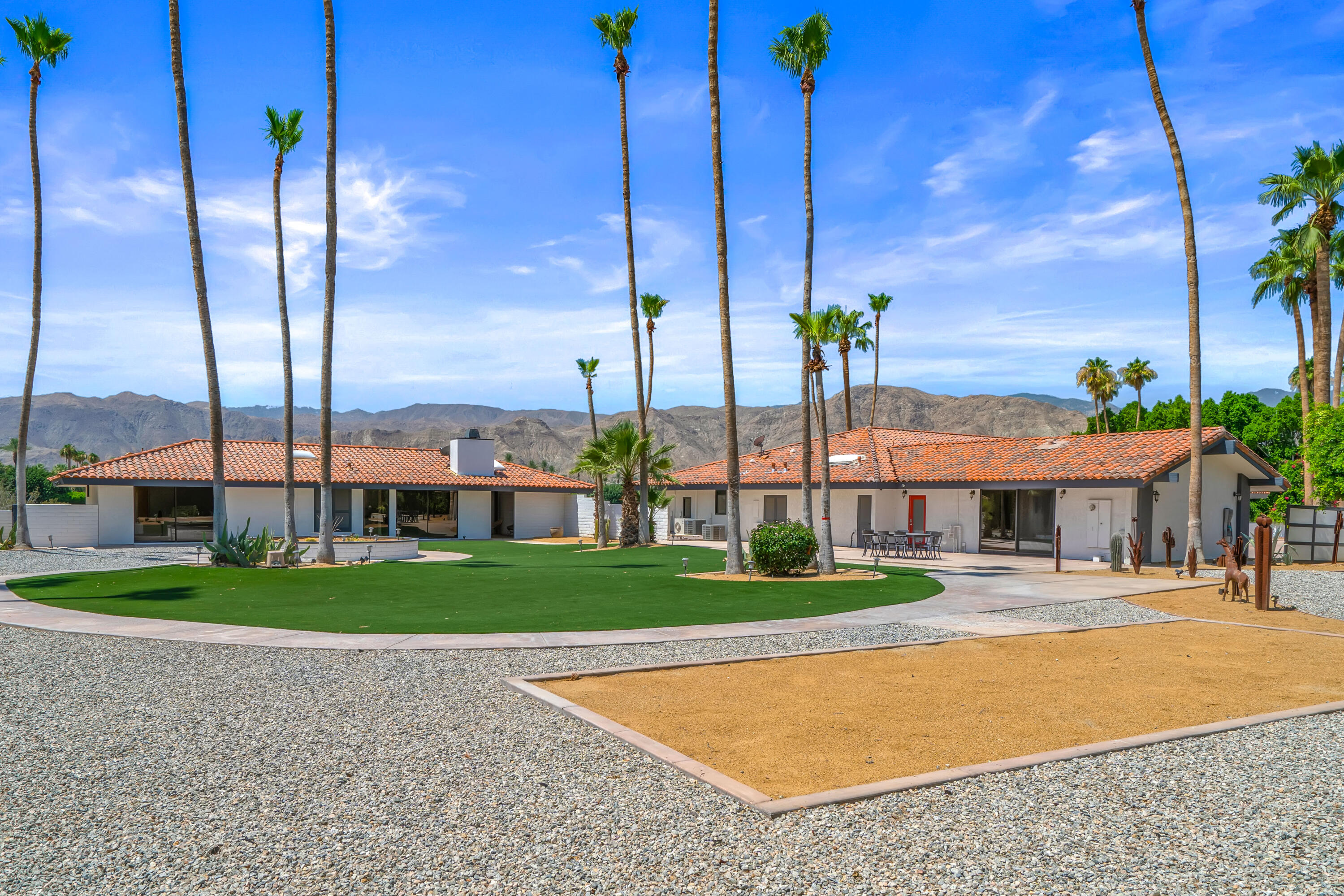 401 Iris Lane Rancho Mirage, CA 92270 - Photo 65 of 87 a view of a city with tall buildings